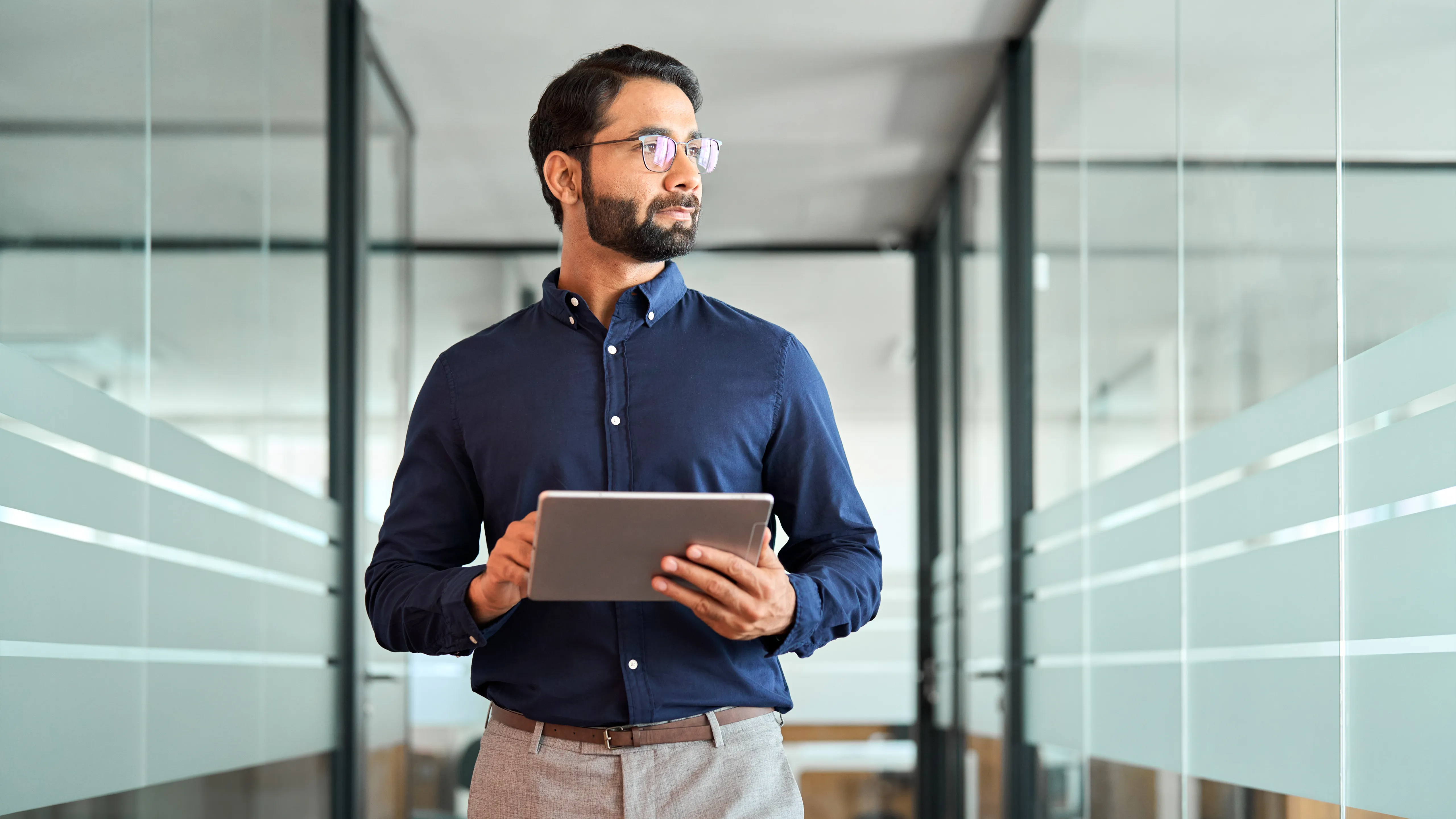 Man In Blue With Tablet