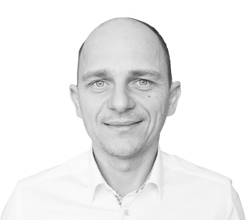 Tomasz Gęsiarz Director—Services
