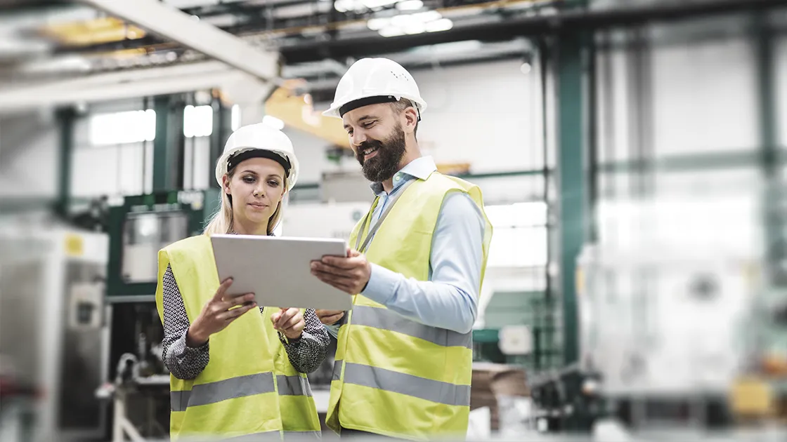Man And Woman With Helmets
